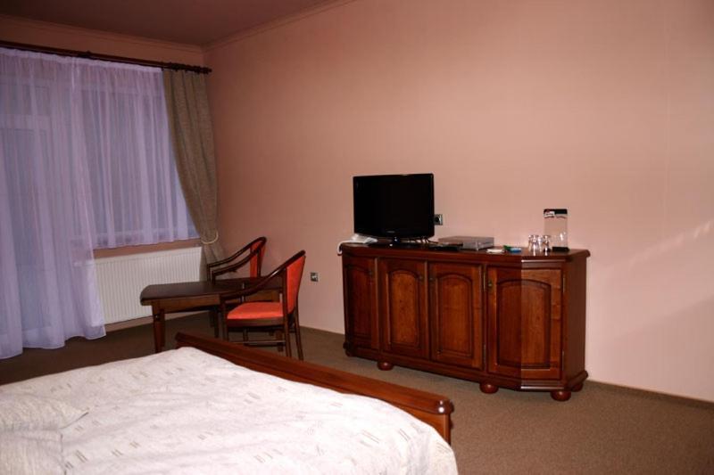 Hotel Zlaty Lev Louny Camera foto